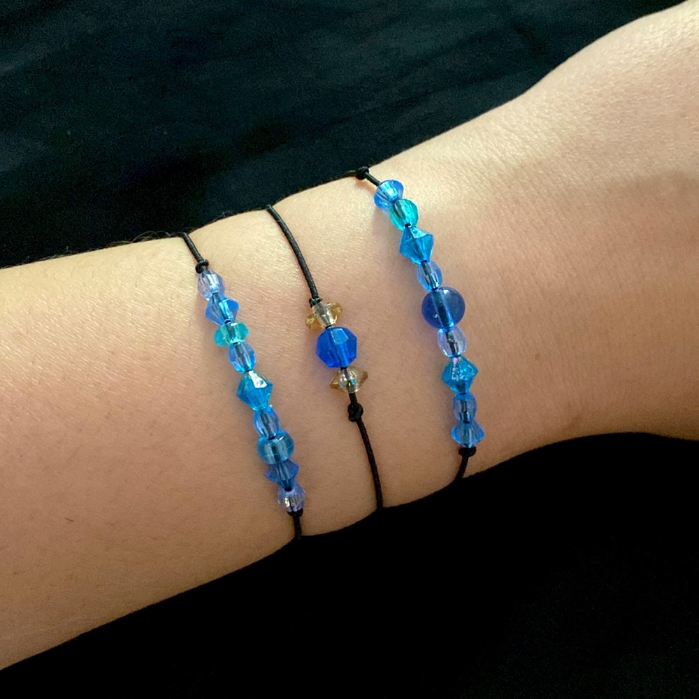 Blue set of charmed bracelets